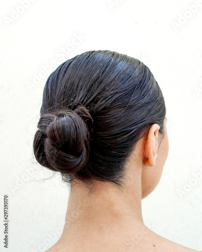 Back view of women in chignon hairstyle