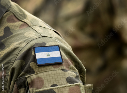 Flag of Nicaragua on military uniform. Army, troops, soldier (collage).
