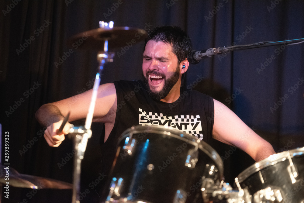Male Musician Playing Drums And Cymbals At Concert . Male Musician Playing Drums And Cymbals At Concert .