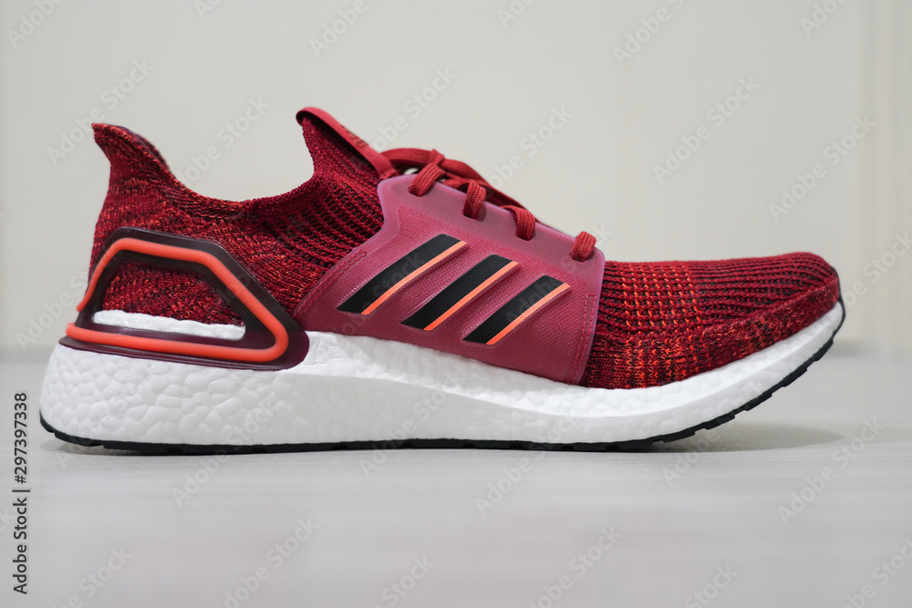 BANGKOK,THAILAND-AUGUST 31: Close-Up on The New Adidas Ultra Boost 2019 Red  Active Maroon on August 31,2019 Stock Photo | Adobe Stock