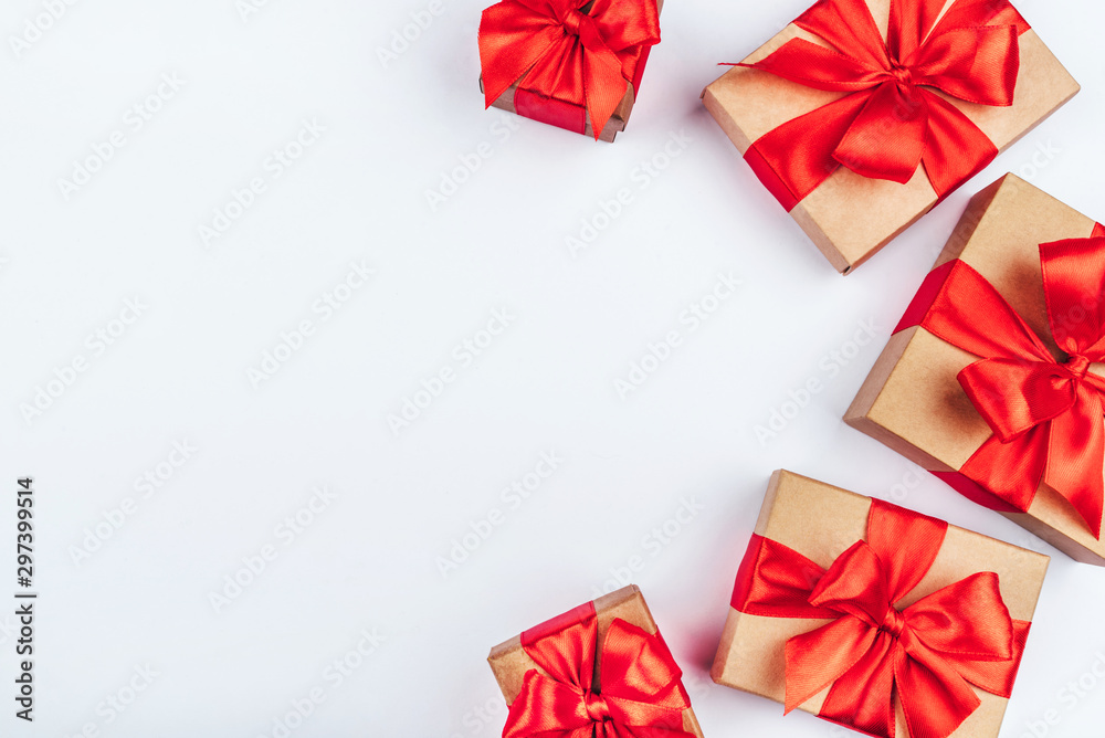 Frame of cardboard gift boxes with red bows. Frame of cardboard gift boxes with red bows.