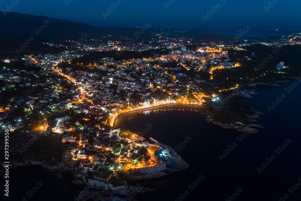 Aerial view of the old city of Ulcinj at night - the southernmost city of the Montenegro.