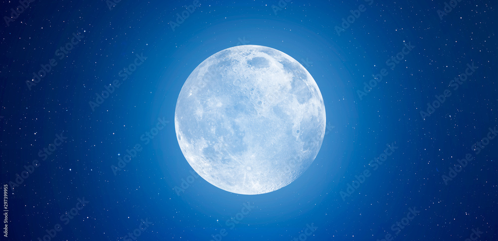 Blue full moon against milky way galaxy 