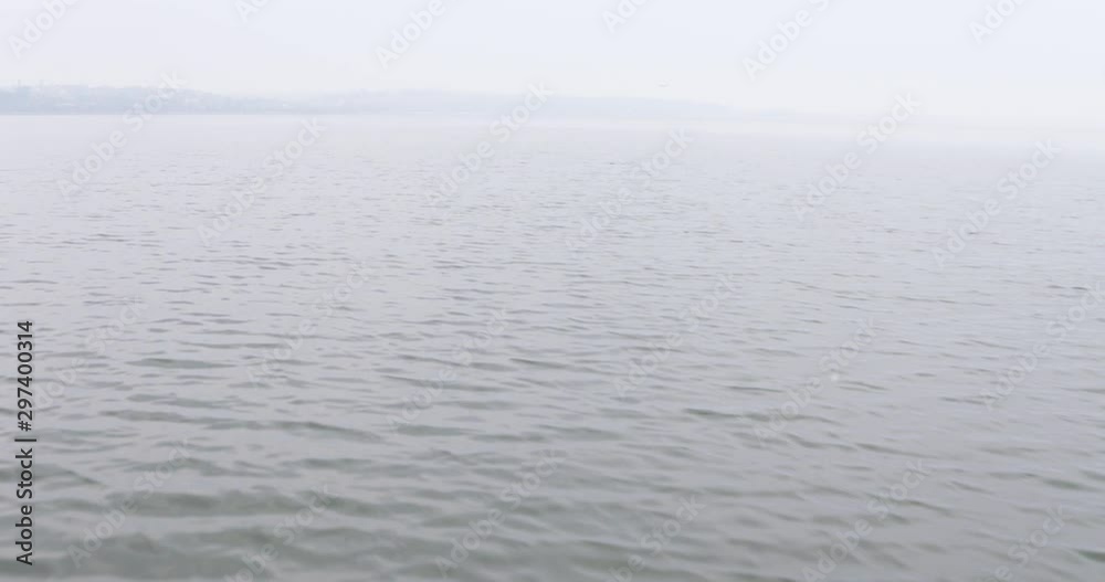 Lake in autumn. Foggy weather on the water. Lake in autumn. Foggy weather on the water.