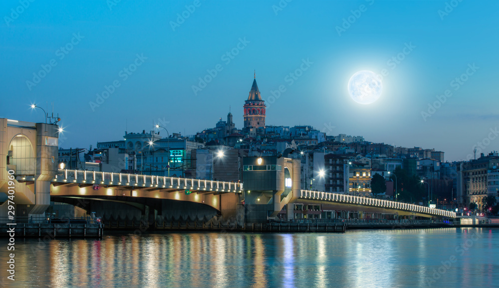 Obraz premium Galata Tower, Galata Bridge, Karakoy district and Golden Horn at amazing sunset sky - Istanbul, Turkey 