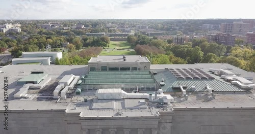 Flying over Roof of Large Museum