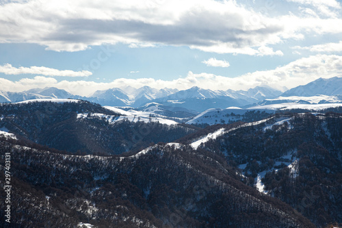 The Caucasus mountains and the ski resort "Dombay" in Sunny weather