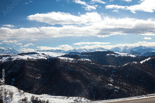 The Caucasus mountains and the ski resort  Dombay  in Sunny weather