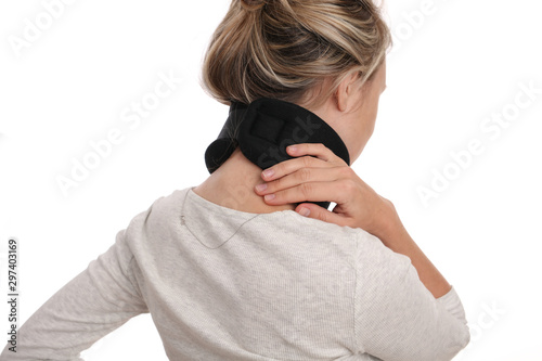 Woman wearing neck brace for neck pain photo