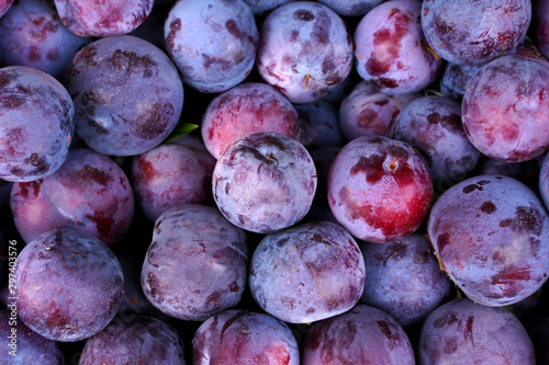Canvas Print fresh ripe plums as background