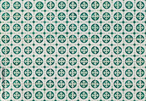 Close-up of green ceramic tiles (azulejos) in Lisbon, Portugal. High resolution full frame textured background.
