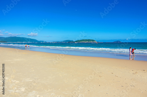 Exotic beach in Sanya on the tropical island of Hainan, South China sea, Asia photo