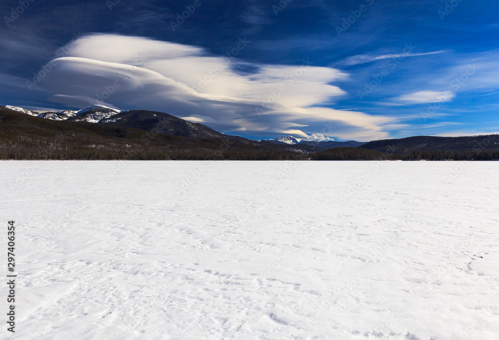 Lake Granby frozen in February with Lenticular clouds