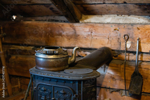 Wooden, copper, metal old vintage pots, jars, pan, wheel in retro style. Vintage kitchenware