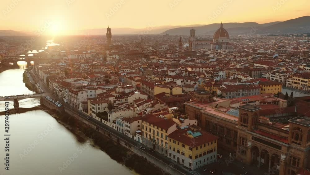 Aerial Drone View: Historically and Culturally Rich Italian Town on the Sunny Day. Beautiful Old City With Medieval Churches and Cathedrals. River Runs through the City