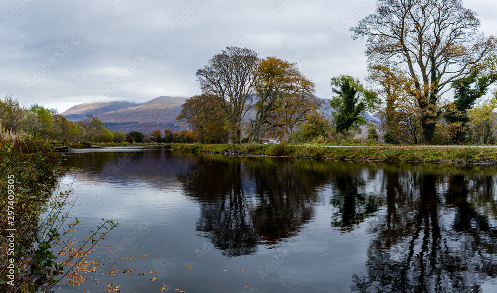 the caledonian canal in fort william with ben nevis in the background in the argyll region of the highlands of scotland during autumn the caledonian canal in fort william with ben nevis in the background in the argyll region of the highlands of scotland during autumn