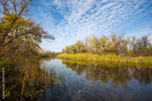 Autumn landscape on river at nice sunny day © Pavlo Klymenko