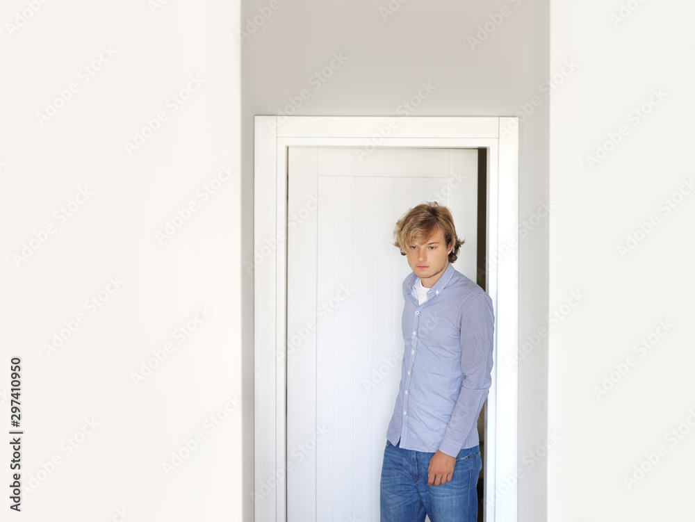 Man opening the door of him home.