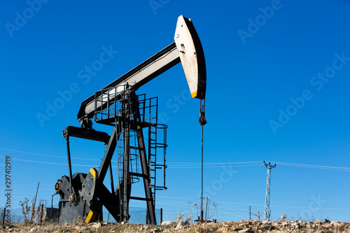 View of Oil Well Pumpjack (Horsehead) at Daylight Oil Industry
