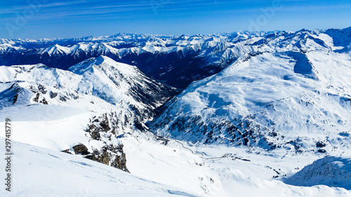 Winter mountain landscape with mountains and blue sky. Molltaler Gletscher. Austria © niziur