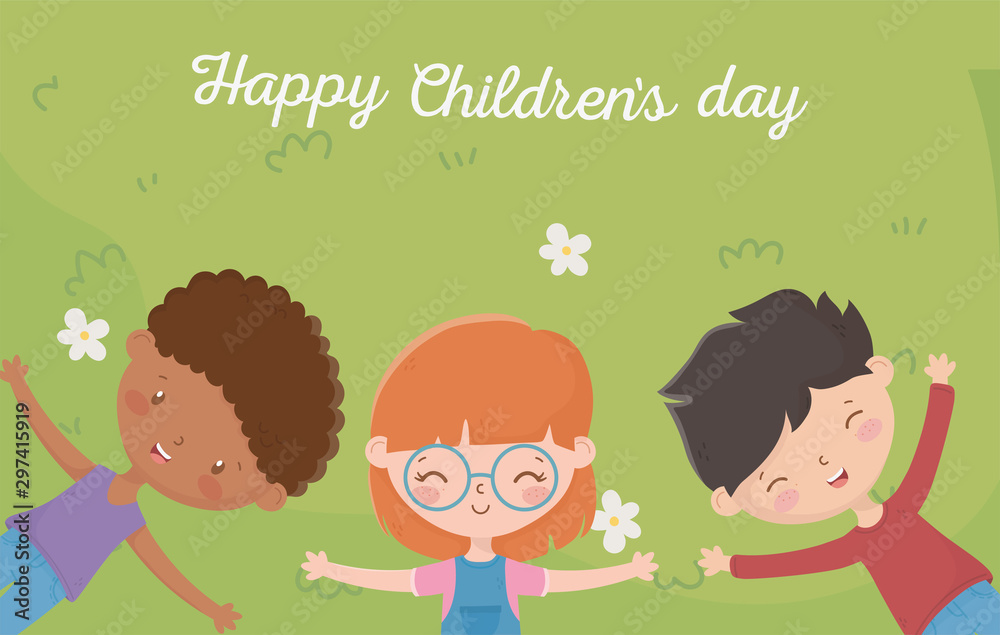 happy childrens day girl and boys resting in the meadow with flowers happy childrens day girl and boys resting in the meadow with flowers