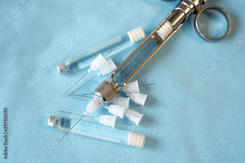 carpool syringe for local dental anesthesia with disposable needles photo