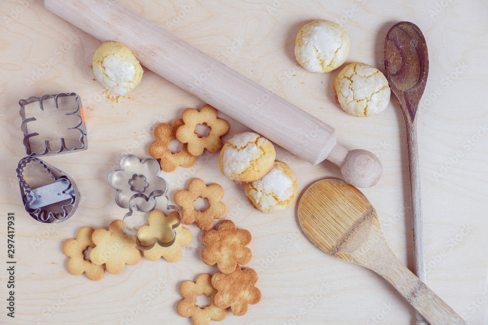 shortbread and coconut biscuits on a wood background