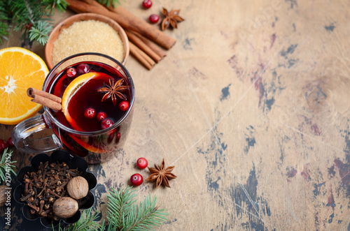 Christmas Mulled Red Wine with Orange, Cranberries and Spices. Holiday Concept.