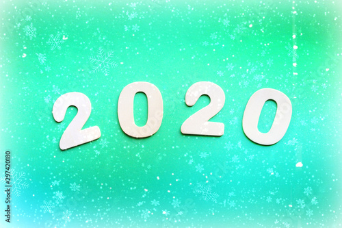 2020. Christmas background, Christmas composition. The figures for 2020 in the green and yellow bright background. Copy space for your text.