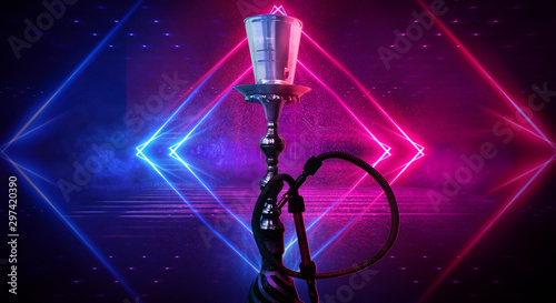 Hookah on a dark background, neon light. Abstract blue and pink neon light smoke background.