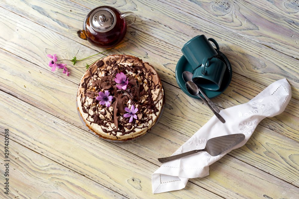 Fototapeta premium Homemade, cake, teapot with tea and cups close-up