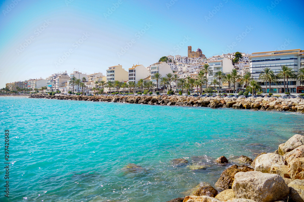ALTEA, SPAIN - OCTOBER 4, 2019: Beautiful houses in Altea with tourist attractions and turquoise sea