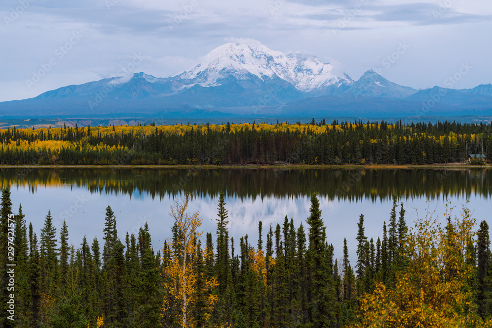 Beautiful fall / autumn color of trees and mountains in remote Alaska