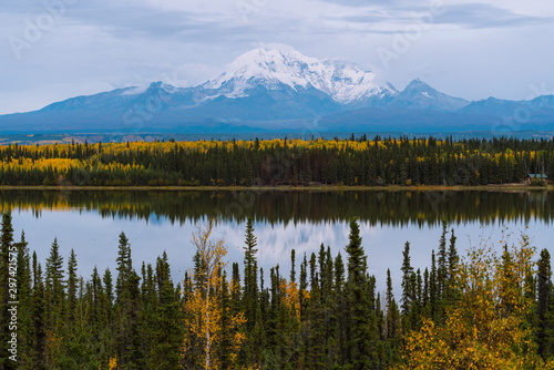 Beautiful fall / autumn color of trees and mountains in remote Alaska