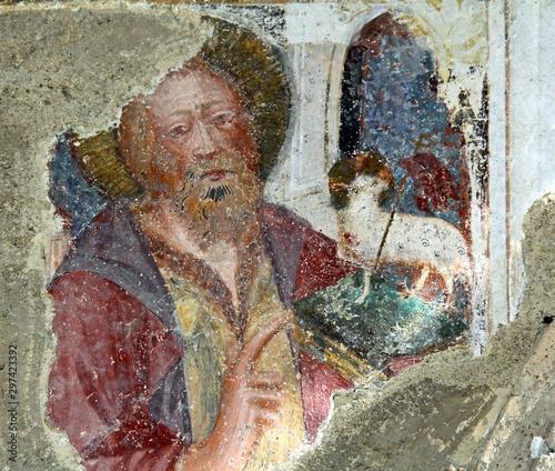 San Giovanni Battista. Frammento di affresco in facciata della chiesa parrocchiale di Gudon (Bolzano) photo