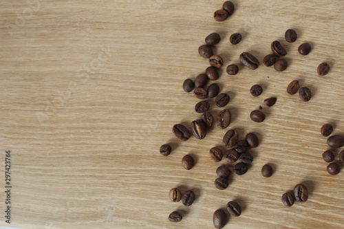 Arabica coffee beans coffee on wooden background