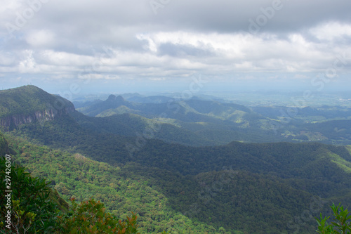 High Hilltop Lookout On A Overcast Moody Day Overlooking Lush Green Hills And Valley In Australia © Amy Michelle