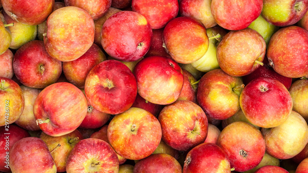 Ripe red apples lie on the counter of the village market Ripe red apples lie on the counter of the village market