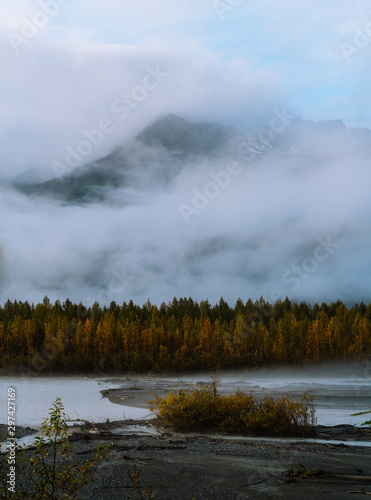 Misty morning with fog around mountains and valley © Martin Hossa