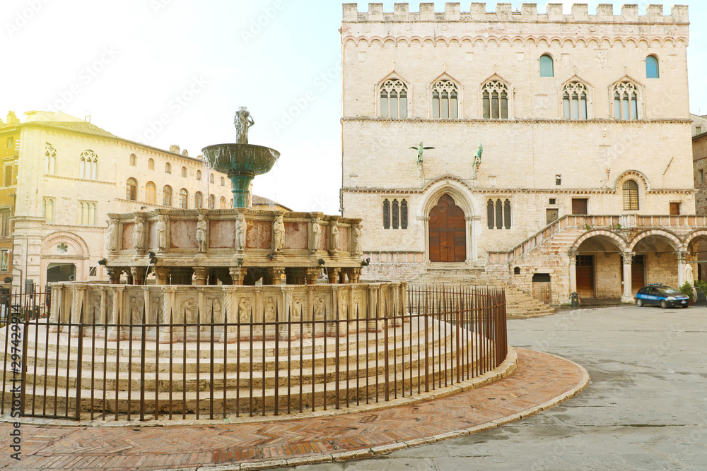 Perugia main square Piazza IV Novembre with Old Town Hall and monumental fountain Fontana Maggiore, Umbria, Italy.