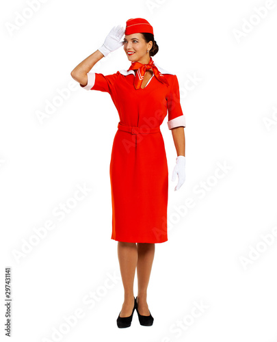 Portrait of a young beautiful Russian stewardess in red uniform