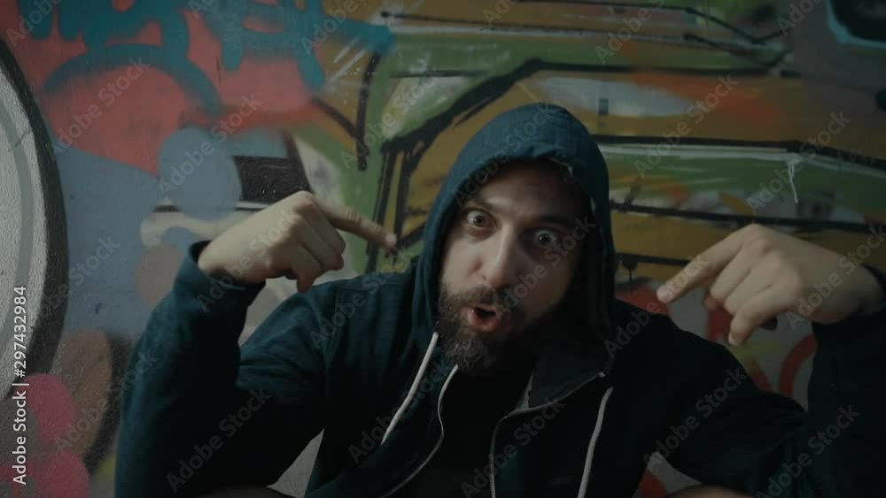 An eccentric controversial energetic male urban rapper.Portrait and ...