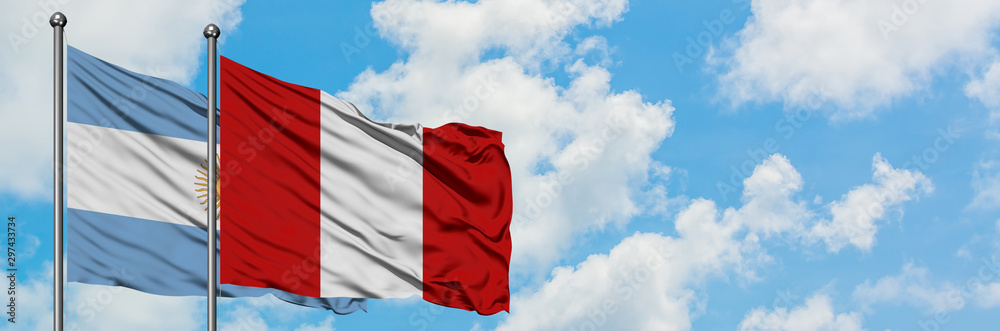 Argentina and Peru flag waving in the wind against white cloudy blue sky together. Diplomacy concept, international relations.