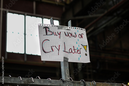 Buy Now or Cry Later Sign for Discount Cheap Second Hand Sale of local business, farmer, seller for extra money, side hustle, second hand sales, getting rid of stuff photo