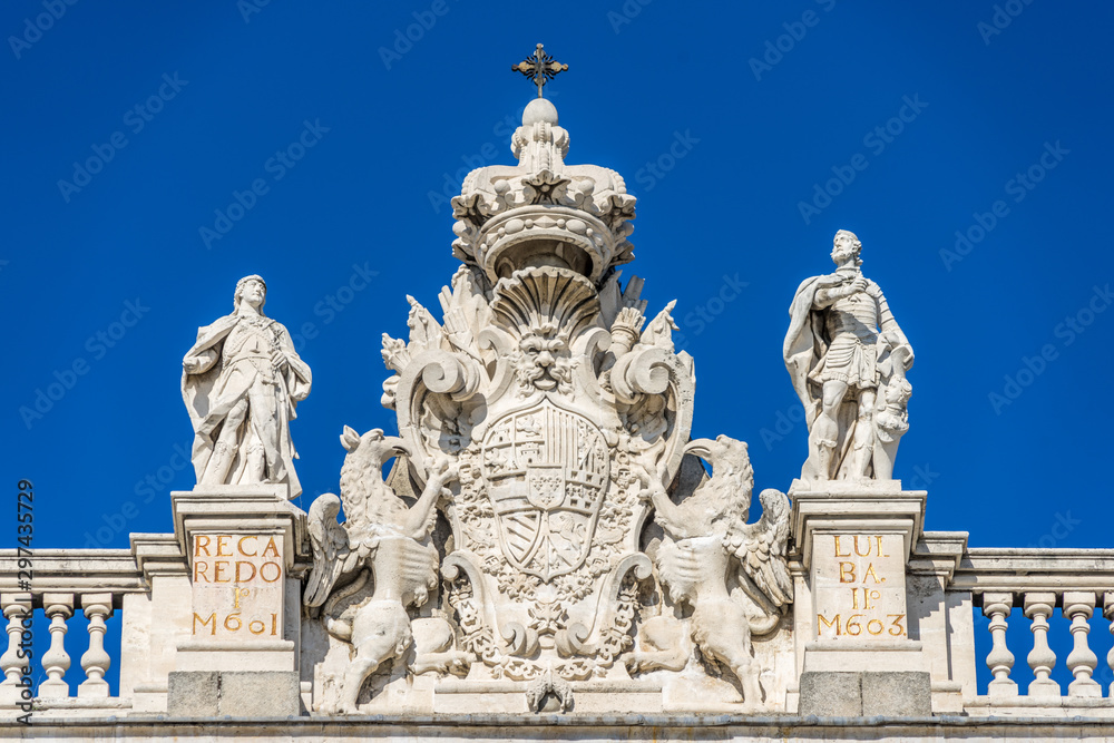 Madrid Royal Palace (Palacio Real) Top East facade. Recaredo and Ervigio visigoth kins. Coat of arms of Phillip V, with the collars of the Orders of the Golden Fleece and of the Holy Spirit.