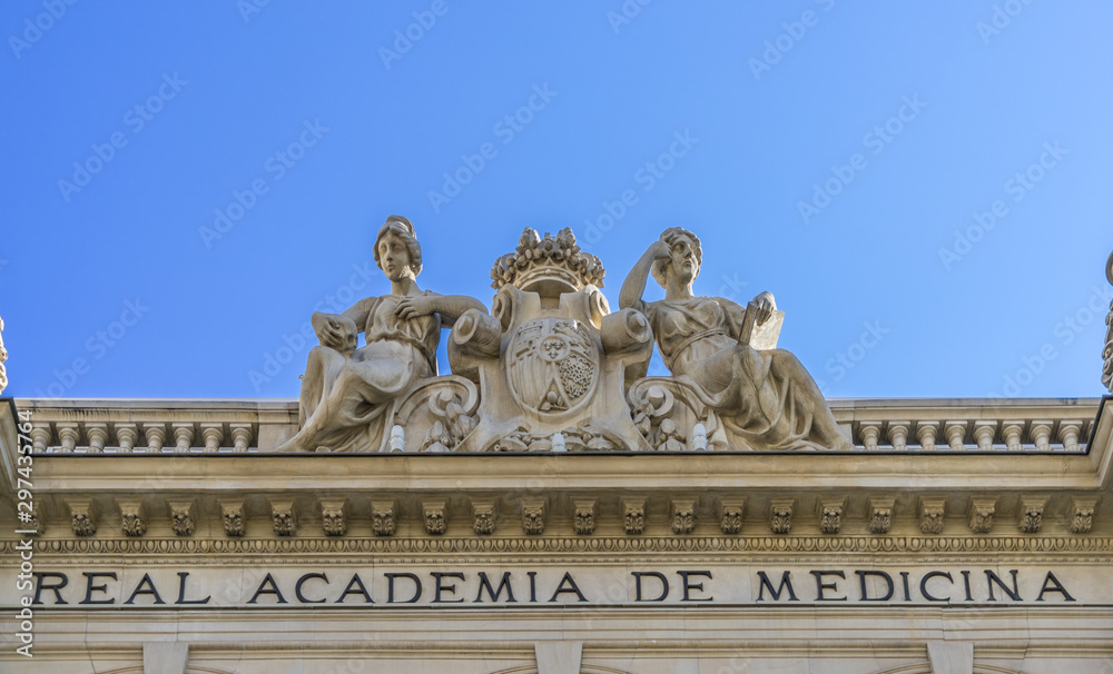 Facade detail of Real Academia Nacional de Medicina (Royal Academy of medicine) building. Built in 1912 by Luis Maria Cabello Lapiedra. Located in Arrieta Street, Madrid, Spain