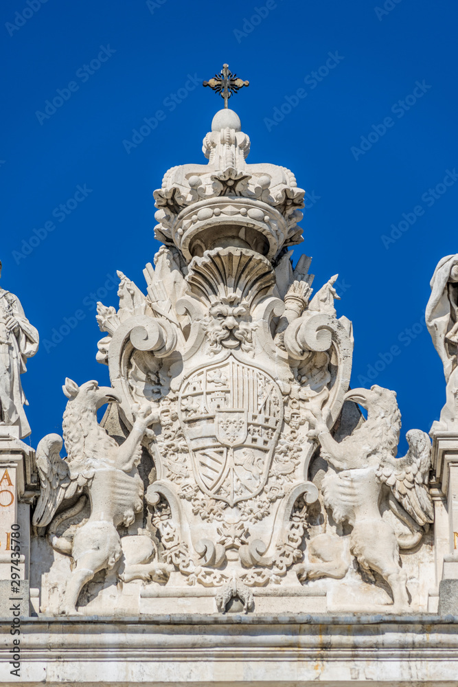 Madrid Royal Palace (Palacio Real) Top East facade. Coat of arms of Phillip V, with the collars of the Orders of the Golden Fleece and of the Holy Spirit.