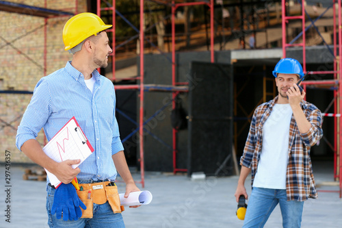Male architects working in ...