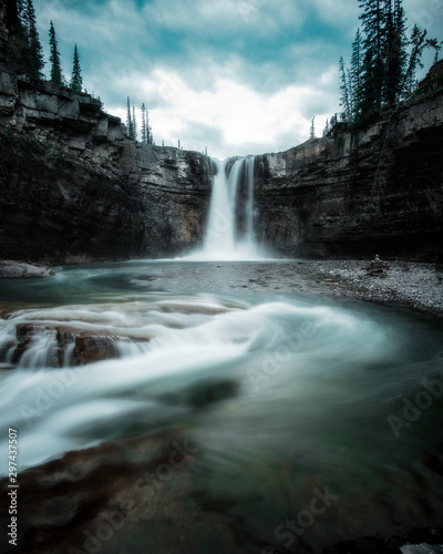 Water streaming down rocks in Ram River Falls, Nordegg, Alberta.