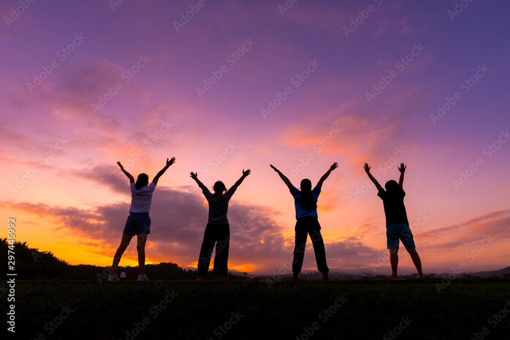 Group of healthy girl show hands with  sunset background.Healthy exercise lifestyle concept. - obrazy, fototapety, plakaty 